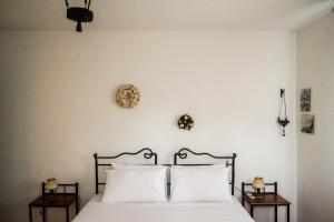 Postel nebo postele na pokoji v ubytování Mega Skinos Villa