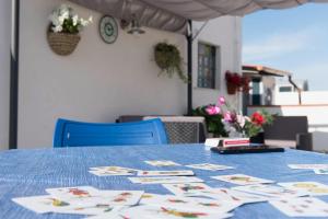 a blue table with a blue table cloth on it at San Vito Lo Capo da Ciccio in San Vito lo Capo