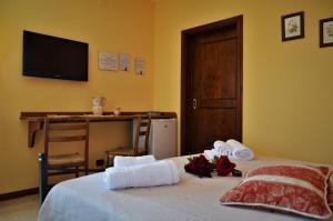 Postel nebo postele na pokoji v ubytování Casa delle Rondini