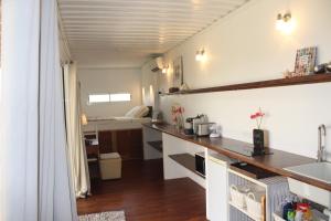 Una cocina o cocineta en carré coco