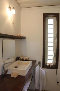 Una cama o camas en una habitación de carré coco