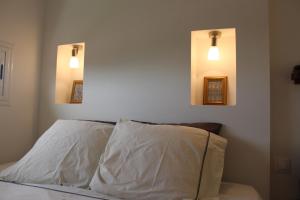 מיטה או מיטות בחדר ב-carré coco