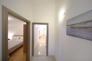 Posteľ alebo postele v izbe v ubytovaní Apartment Mareta