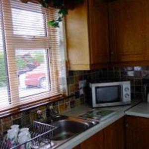 A kitchen or kitchenette at Brielle House