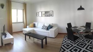 Et opholdsområde på Jasmineiro - Palms Palace Apartment + 22 billeder