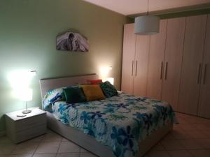 Postel nebo postele na pokoji v ubytování "Profumo di Tiglio"