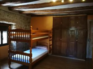 Postel nebo postele na pokoji v ubytování La Bodega Del Camino aka Albergue On TheLe