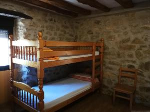 Postel nebo postele na pokoji v ubytování La Bodega Del Camino aka Albergue On TheLe