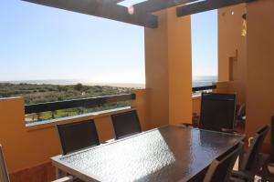 Balkon lub taras w obiekcie Apartamento primera linea Isla Canela