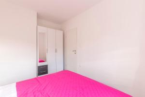 Postel nebo postele na pokoji v ubytování Apartments Karlo