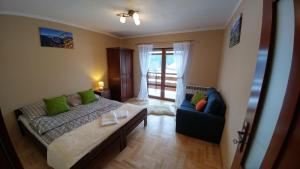 Posteľ alebo postele v izbe v ubytovaní Apartament Sokola Skała