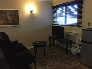 Kuchyň nebo kuchyňský kout v ubytování Greenside Motel