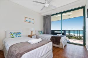 Postel nebo postele na pokoji v ubytování Key Largo Maroochydore + 37 fotografií