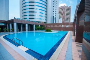 Bazén v ubytování Beta Service Apartment nebo v jeho okolí