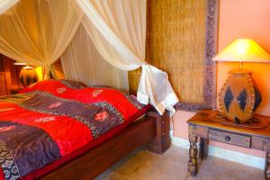 Giường trong phòng chung tại Medana Resort Lombok