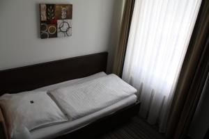 Postel nebo postele na pokoji v ubytování Gasthof Hoppe