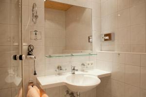 Kúpeľňa v ubytovaní Haus Braunarl + 37 fotografií