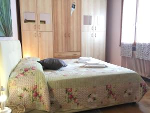Cama o camas de una habitación en Appartamento Cisanello