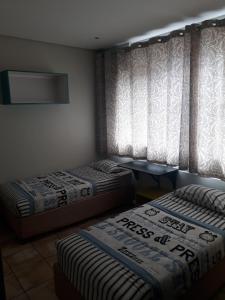 Voodi või voodid majutusasutuse Seaboard Hotel & Holiday Apartments toas