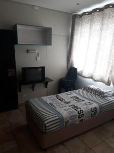 Voodi või voodid majutusasutuse Seaboard Hotel & Holiday Apartments toas