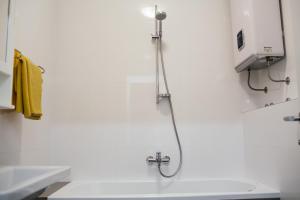 Ein Badezimmer in der Unterkunft Stina Apartment