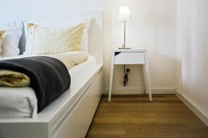 Ein Bett oder Betten in einem Zimmer der Unterkunft Stina Apartment