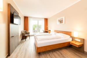 Postel nebo postele na pokoji v ubytování Hotel Spree-idyll