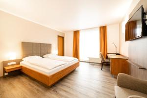 Postel nebo postele na pokoji v ubytování Hotel Spree-idyll