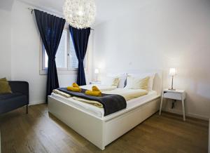 Ein Bett oder Betten in einem Zimmer der Unterkunft Stina Apartment