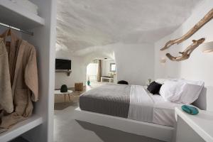 Łóżko lub łóżka w pokoju w obiekcie Terra Mare Suites