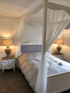 Ένα ή περισσότερα κρεβάτια σε δωμάτιο στο Suites Residences Spa