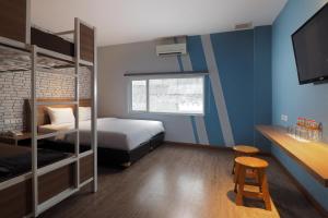 Postel nebo postele na pokoji v ubytování Kama Hotel + 37 fotografií