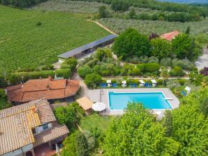 an aerial view of a estate with a swimming pool at Agriturismo Tontenano in Bucine