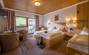Voodi või voodid majutusasutuse Hotel Garni Klocker toas