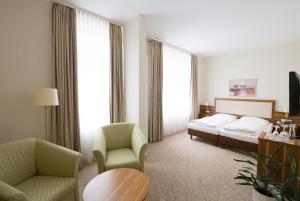 Ein Bett oder Betten in einem Zimmer der Unterkunft Boardinghouse am Wall