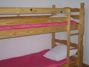 Poschodová posteľ alebo postele v izbe v ubytovaní Gîte Bien Etre