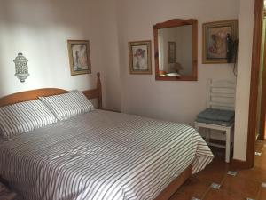 Ένα ή περισσότερα κρεβάτια σε δωμάτιο στο Vacacional playa Las Galletas