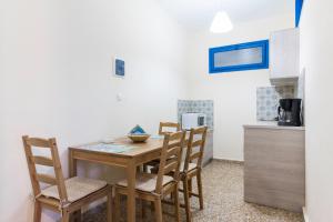 A kitchen or kitchenette at Vassos Apartments