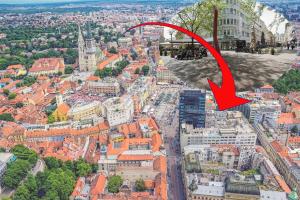 an aerial view of a city with a red arrow at Studio Apartment Baltazar Zagreb centre in Zagreb