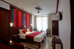 Letto o letti in una camera di Coral Sands Hotel