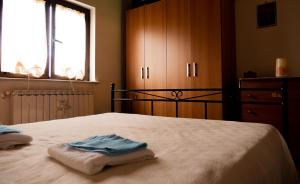 Giường trong phòng chung tại Campo varone