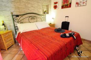 A bed or beds in a room at B&B Giuseppe Verdi