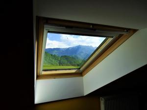 Nespecifikovaný výhled na hory nebo výhled na hory při pohledu z apartmánu