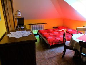 Postel nebo postele na pokoji v ubytování Apartmaji Pr-Gujlu Sela nad Podmelcem 5220 TOLMIN