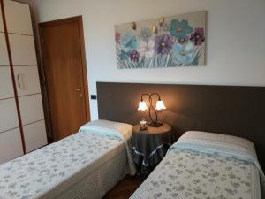 Postel nebo postele na pokoji v ubytování Marinella B&B + 37 fotografií