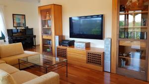 A television and/or entertainment centre at West Crete Chania - Villa Europa
