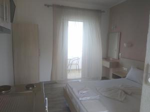 Posteľ alebo postele v izbe v ubytovaní Karantola Studios Kallirachi