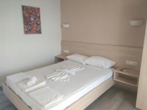 Posteľ alebo postele v izbe v ubytovaní Karantola Studios Kallirachi