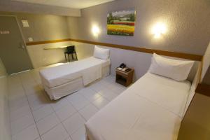 Cama ou camas em um quarto em Inter Hotel