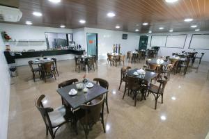 Um restaurante ou outro lugar para comer em Inter Hotel